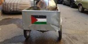 بالبلدي : على عربة فول وفي الشوارع.. أهالي الأقصر يعبرون عن تضامنهم بالعلم الفلسطيني